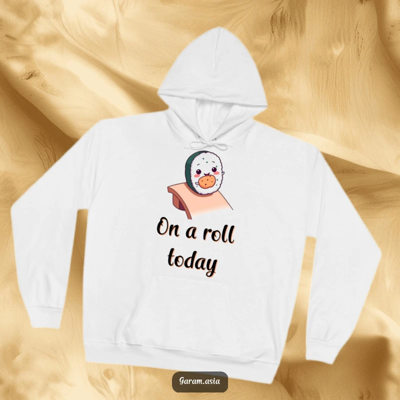 Funny kawaii smiling sushi roll character rolling down a ramp on a soft, warm hoodie.